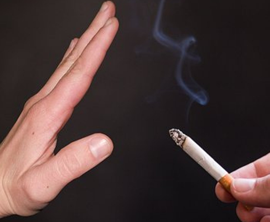 Smoking associated with increased risk of COVID-19 symptoms