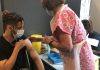 Hundreds of young people receive first Covid-19 jabs during two-day walk-in vaccination drive for over-18s at Kingston University