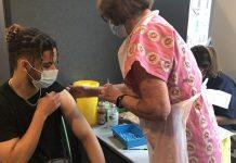Hundreds of young people receive first Covid-19 jabs during two-day walk-in vaccination drive for over-18s at Kingston University