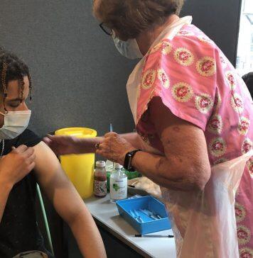 Hundreds of young people receive first Covid-19 jabs during two-day walk-in vaccination drive for over-18s at Kingston University