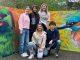 Management students organise international artist to paint mural for rest-home