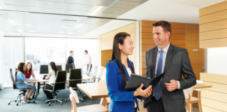 How can business leaders improve work environments in 2022?