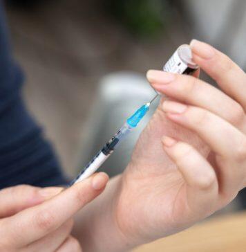 Interrupting immune-suppressing treatment can boost COVID vaccine response